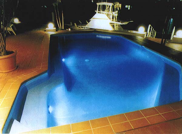 swimming pool glowing at night
